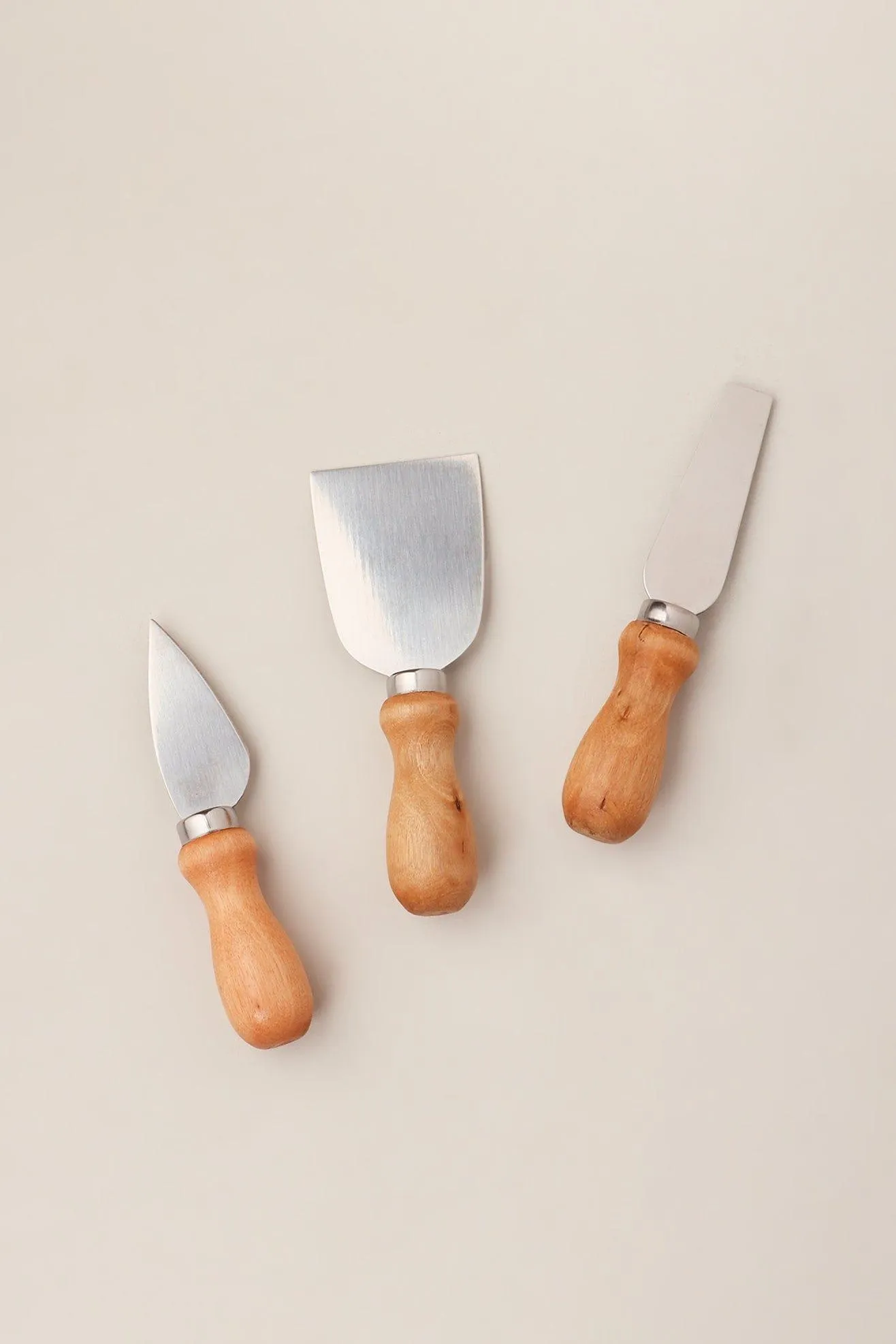 A set of 3 Cheese Knives and Board