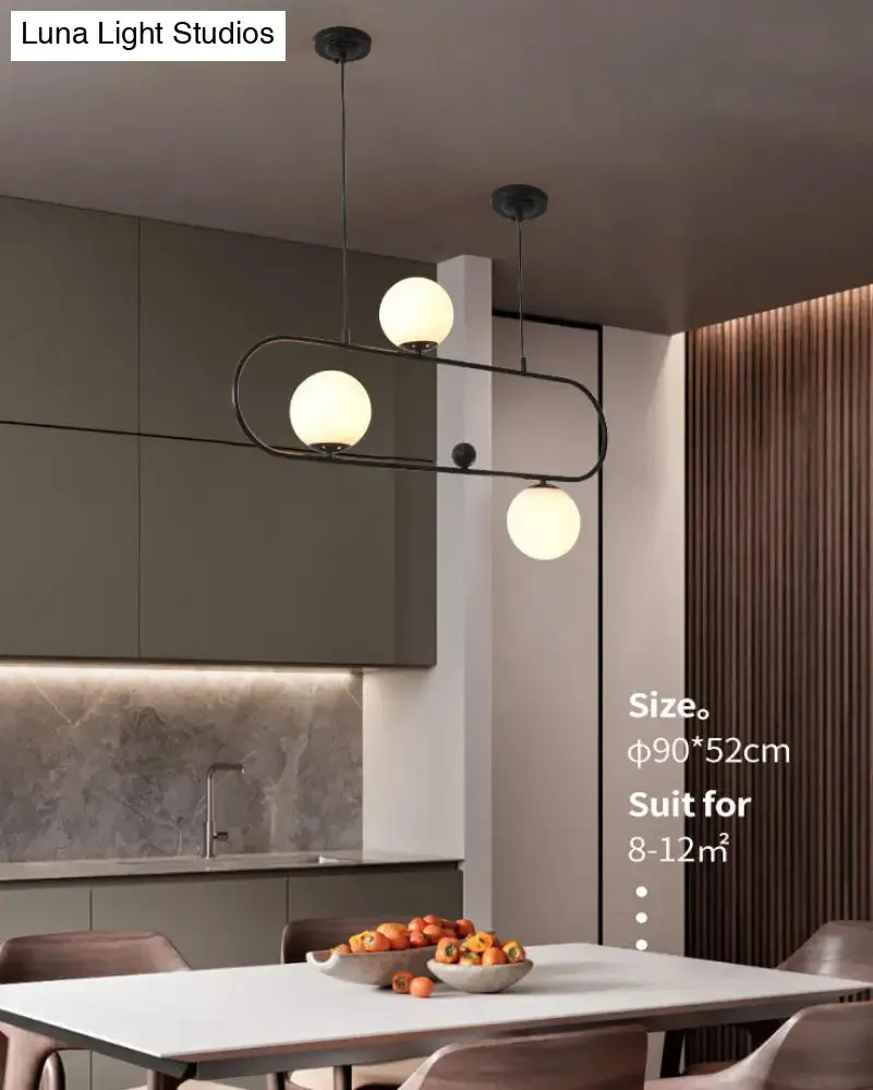 Minimalist Ellipse Pendant Light: Modern Glass Globe Ceiling Fixture for Living Room Island