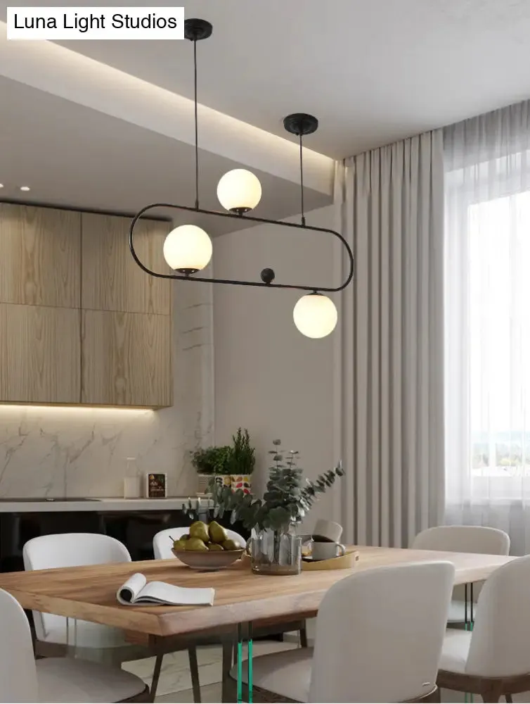 Minimalist Ellipse Pendant Light: Modern Glass Globe Ceiling Fixture for Living Room Island